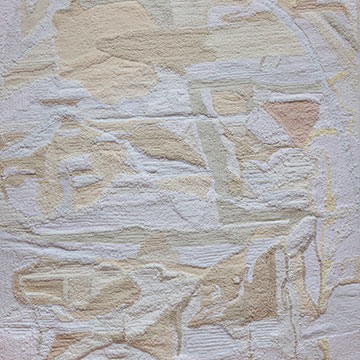 a textural abstract work in whites, grays and creams